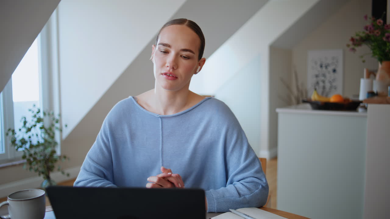 Happy businesswoman beginning video conference at comfortable kitchen closeup