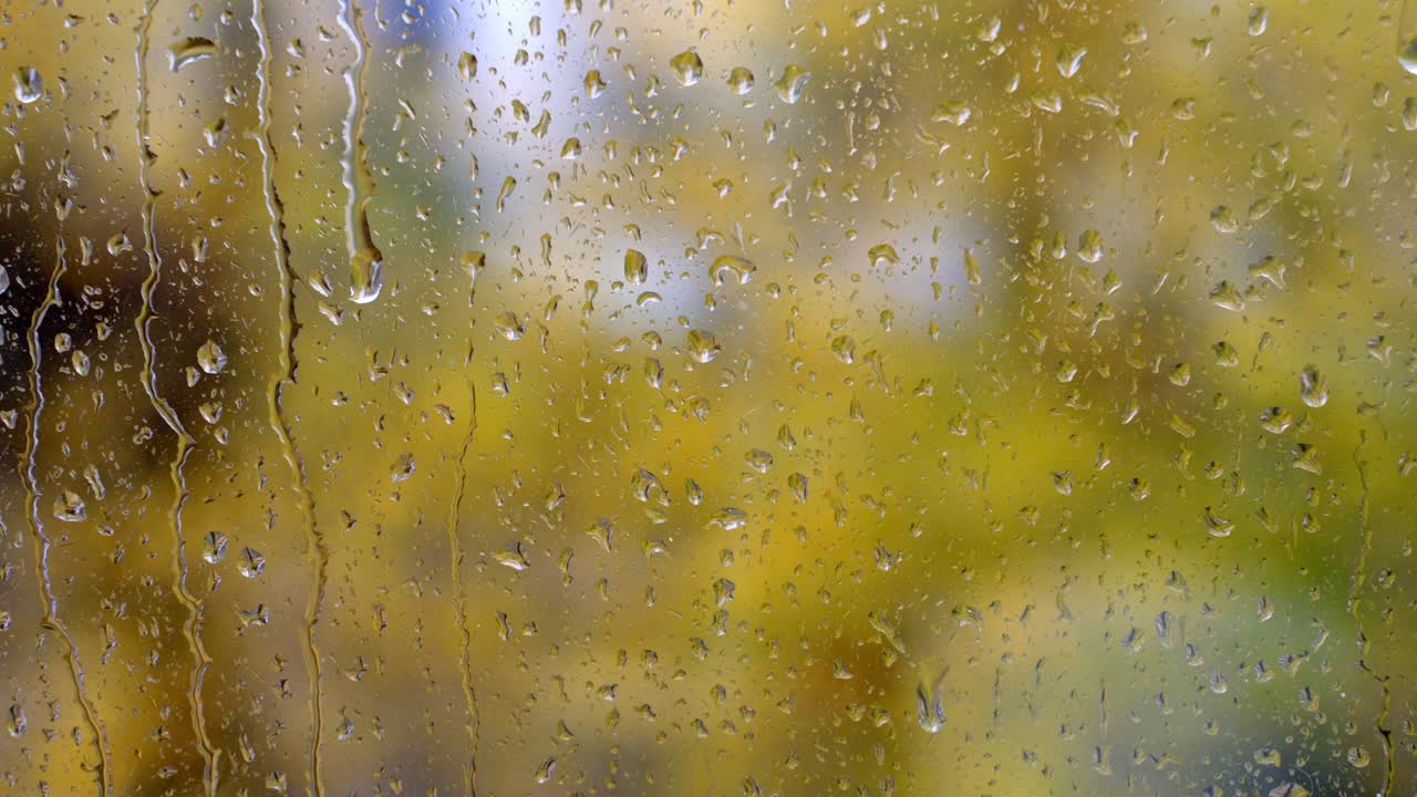 Raindrops Trickling Down A Glass Window Like Teardrops Falling From The Sky. Autumn, Nature, Fall, Weather.