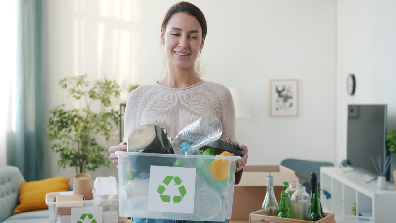 Woman Recycling at Home