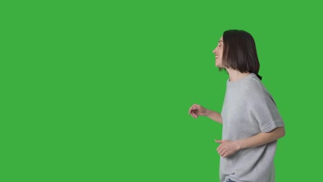 woman dancing and walking on green screen