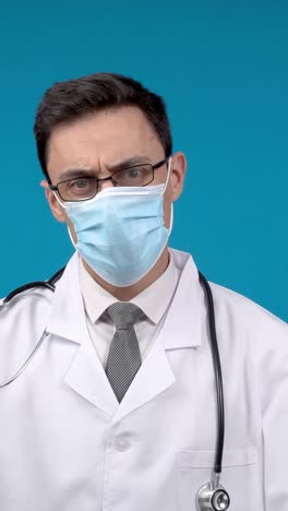 doctor putting on and taking off a face mask
