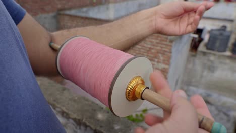 indian man using kite chakri