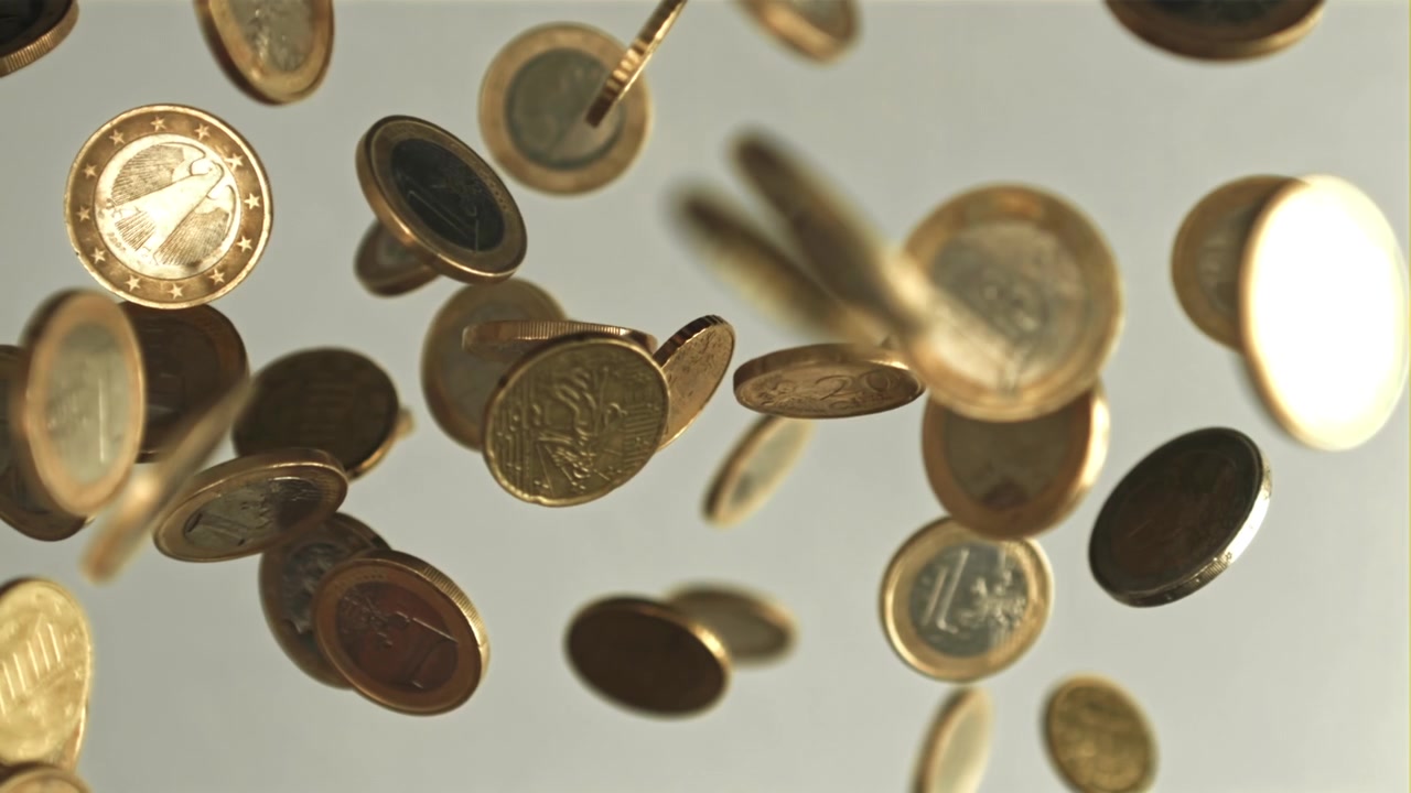 Golden Euro Coins Falling in Slow Motion
