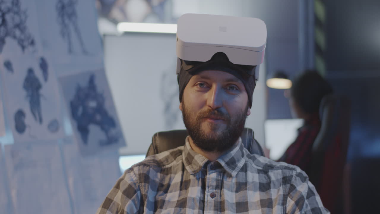 Man Wearing VR Headset in a Modern Office