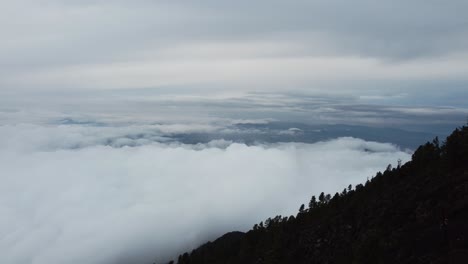 flying over the clouds from the highest volcano in guatemala