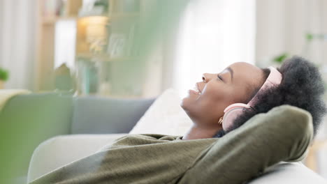 young woman listening to music while relaxing