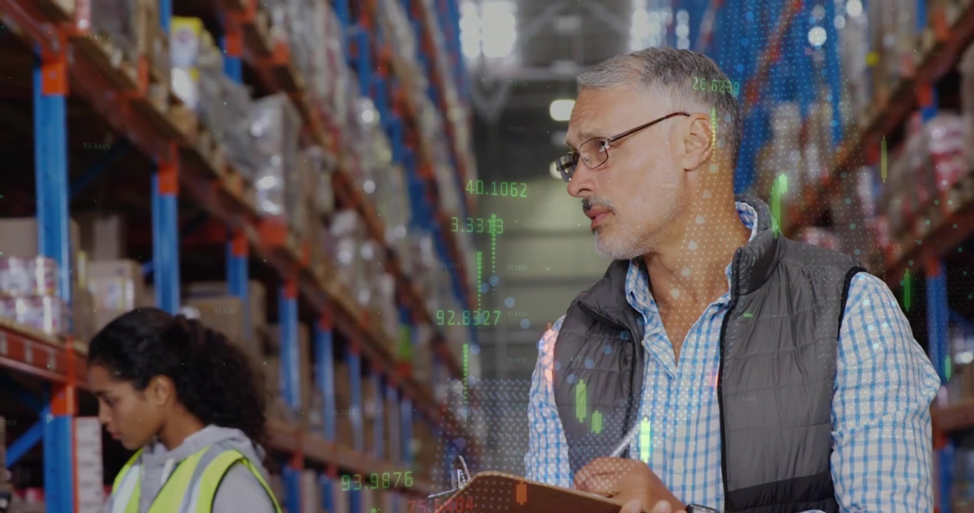 Warehouse Managers Reviewing Inventory with Digital Data Overlays