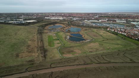 Nature-reserve-with-wind-turbine-at-Fleetwood-Marshes-Nature-Reserve