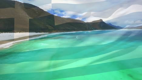 digital composition of greece flag waving against aerial view of waves in the sea