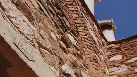 brick wall with dates in the temple of artemis in sardis