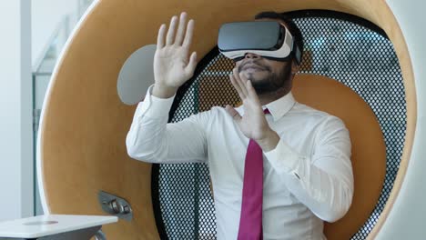 focused businessman in vr headset