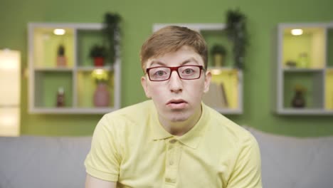 close-up portrait of curious young man.