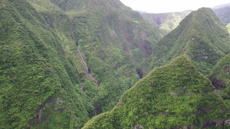 aerial view over the dramatic landscape around takamaka waterfalls and marsouins river, reunion island