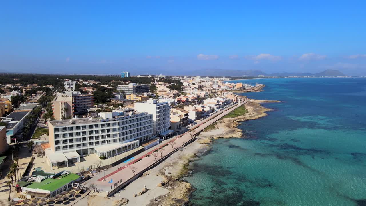 Experience the breathtaking beauty of Can Picafort in Mallorca, showcasing sandy beaches, turquoise waters, and a vibrant beachfront area. A perfect destination for relaxation and adventure.