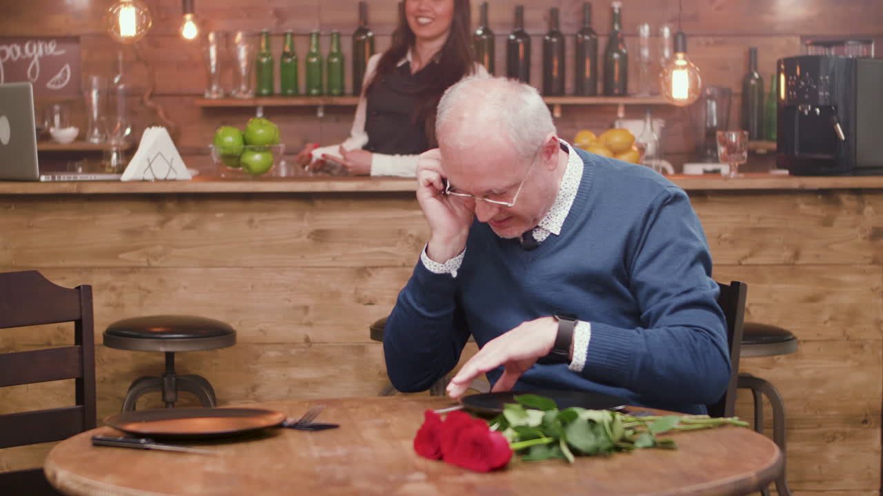 Man waiting in a restaurant