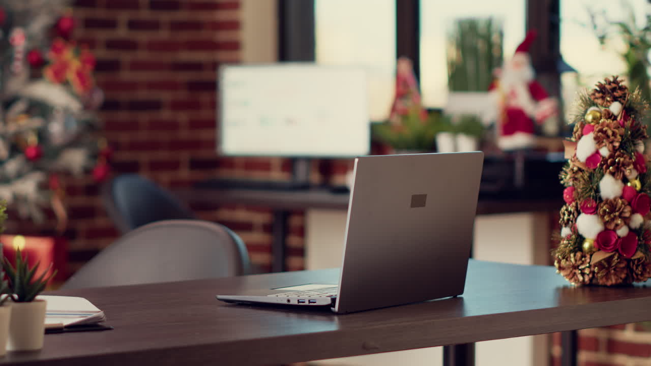 Startup office with laptop and christmas decorations