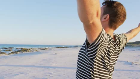 Video-of-do-it-for-them-over-happy-caucasian-man-on-beach