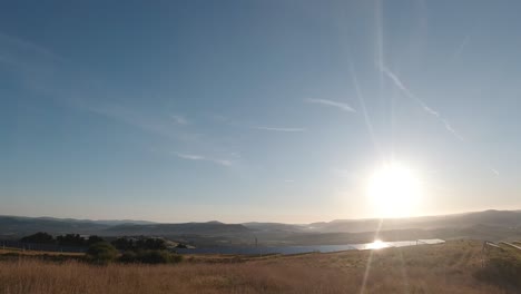 Sunlight-Shining-Brightly-on-Solar-Farm-with-Rich-Blue-Sky