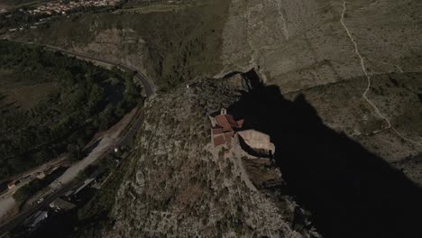 Medieval-hermitage-chapel-looks-down-onto-French-village-Cases-de-Pene