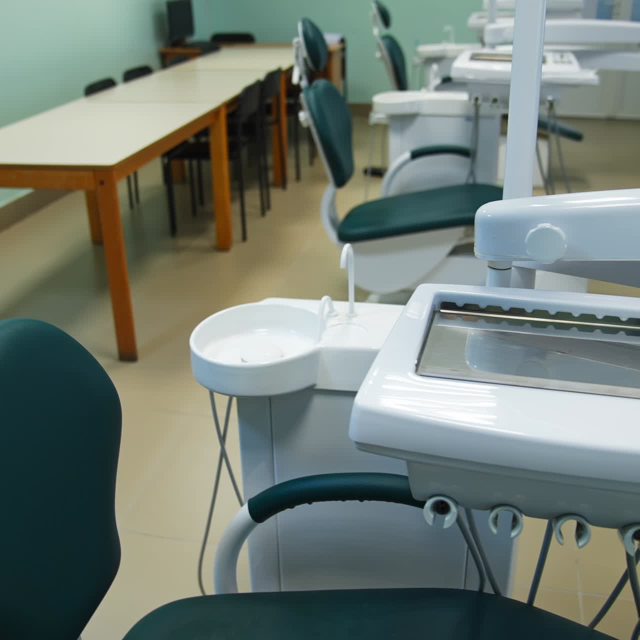 Training dentist armchair for practical lessons at medical university. Working place for future stomatology professionals