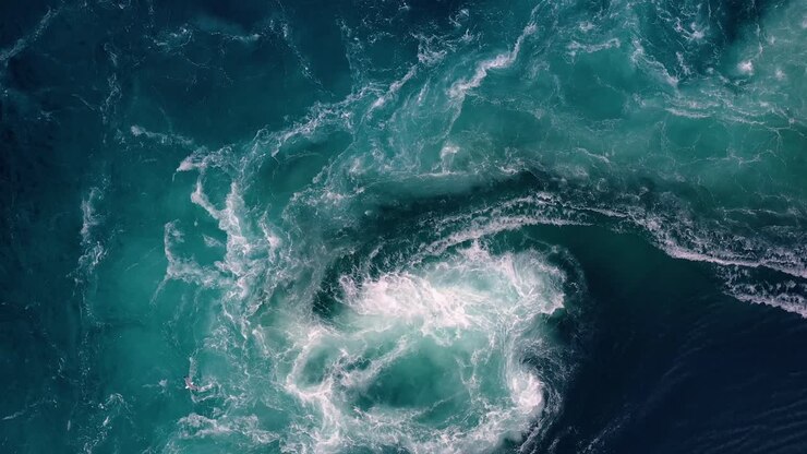 Waves of water of the river and the sea meet each other during high tide and low tide.