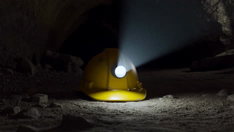 mining helmet in a dark cave