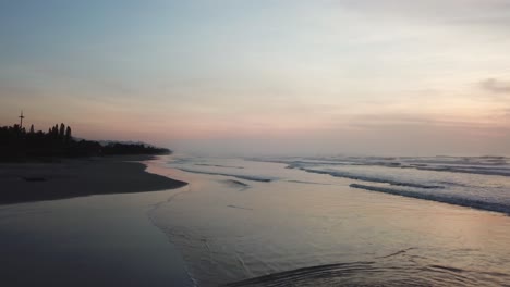 pink sky and ocean sunset, aerial shot, brazil