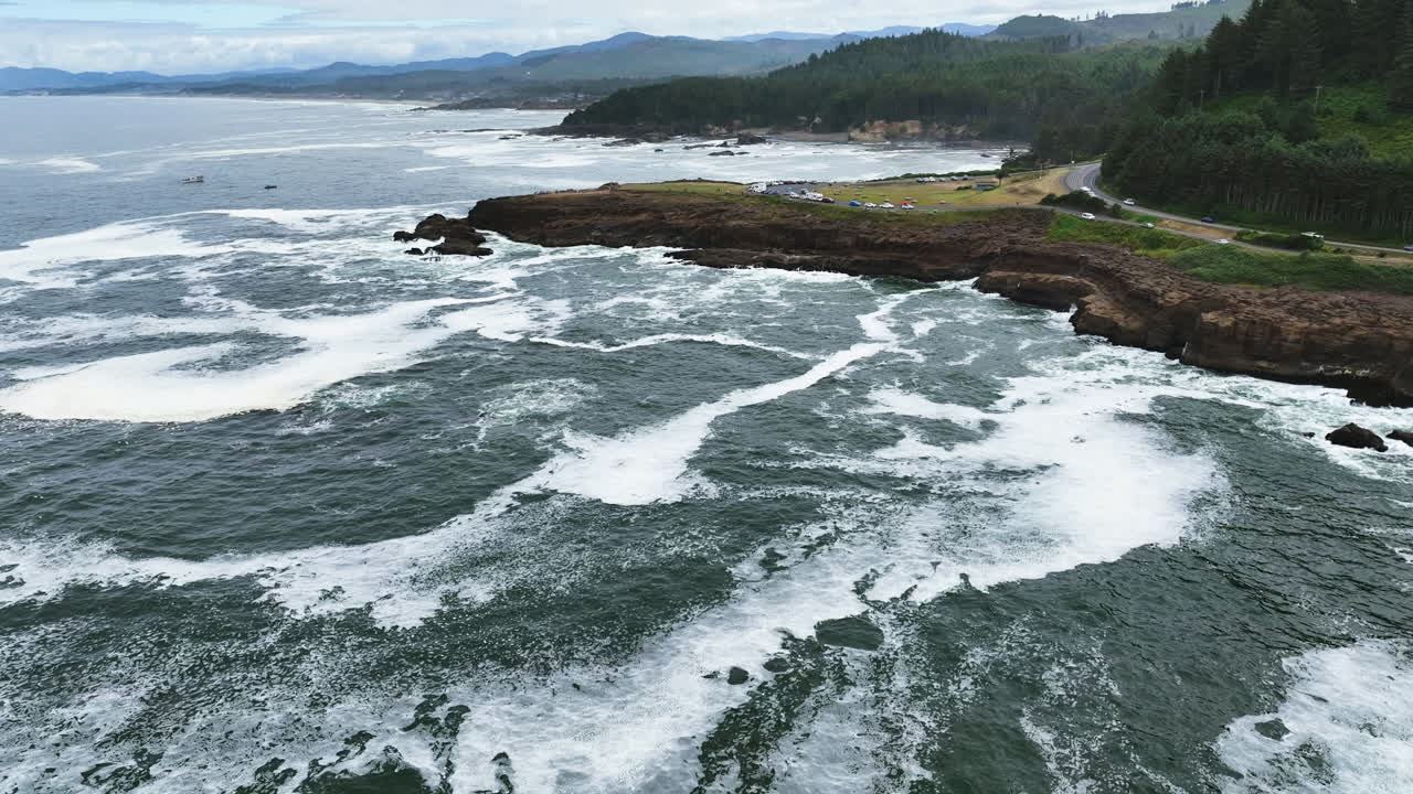 Drone searching for whales on the coast of the Boiler Bay, in cloudy Oregon, USA