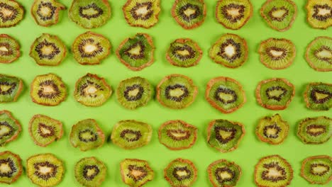 kiwi slices close up background of green, fresh fruit texture.