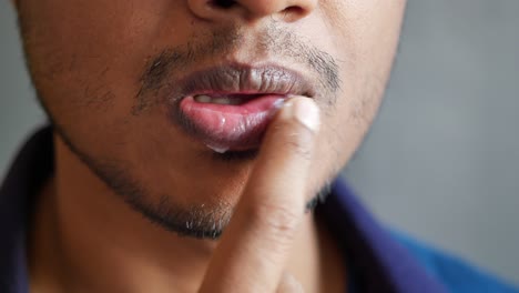 Close-up-of-man-hand-using-petroleum-jelly