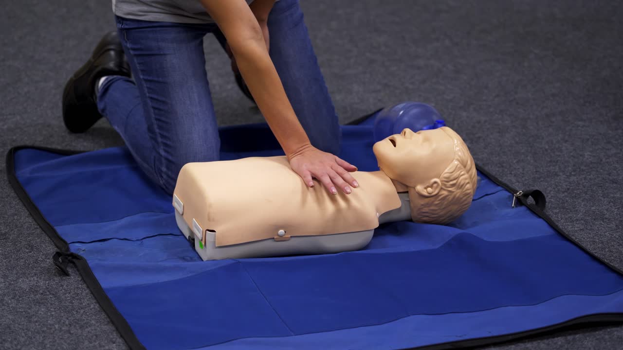 Infant CPR manikin first aid. Cardiopulmonary resuscitation and first aid for child