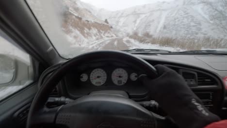 driving over song kol lake in the middle of winter with a blizzard and freezing conditions