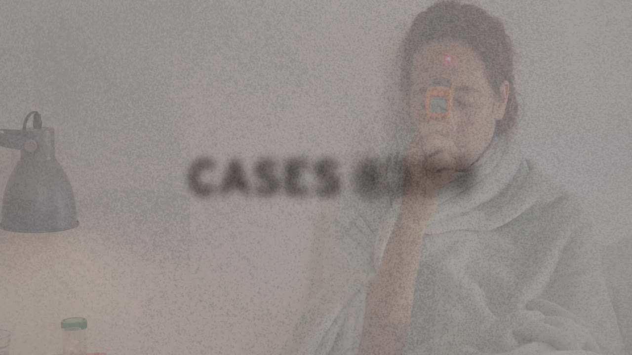 Coronavirus titles over sik woman taking temperature.