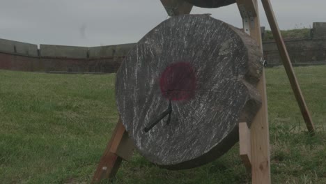 axes are thrown to hit wooden target, philadelphia renaissance fair, fort mifflin, pennsylvania