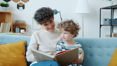 mother and son reading a book together