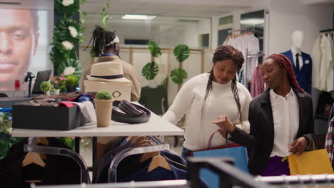 women with shopping bags in thrift shop