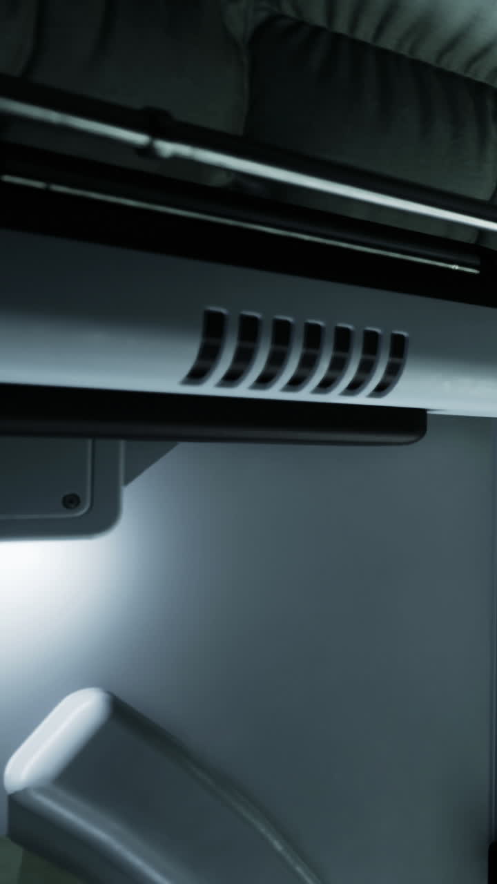 Light source in a dark space under a shelf with a vent