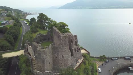 Reveal-drone-shot-of-King-John-castle-in-Carlingford,-Ireland,-Co