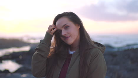 a young woman enjoying the sunrise