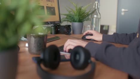 man working in the office in front of the computer