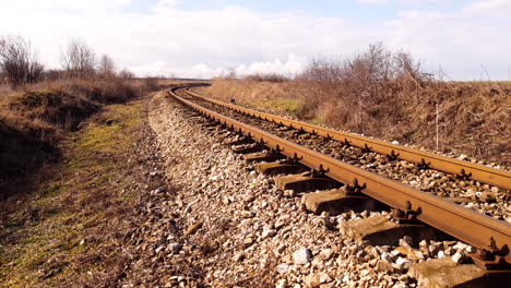 Empty railroad train track steel rails, ties and gravel