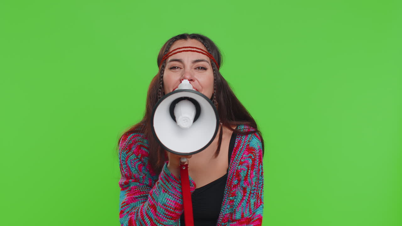 Woman talking with megaphone proclaiming news loudly announcing advertisement pointing empty place