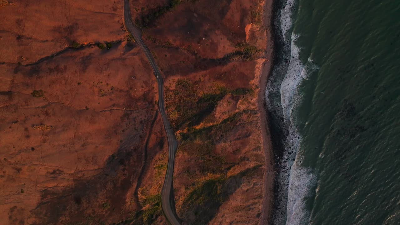 Bodega Bay windy scenic coastal highway Bolinas Sonoma Coast State Park Pacific Ocean California aerial drone birds eye static shot car driving golden sunset Fort Ross Redwood Point Reyes Salmon Creek