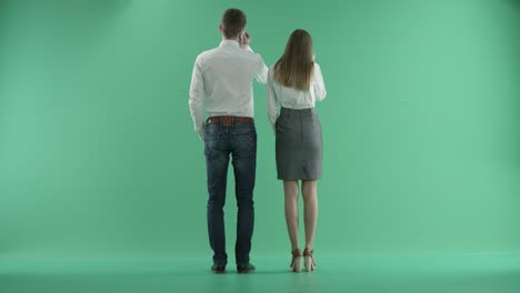 businessmen talking on the phone on a green screen