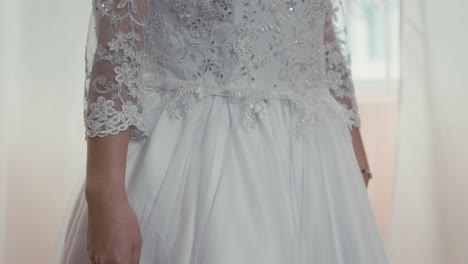 bride trying on wedding dress for a wedding