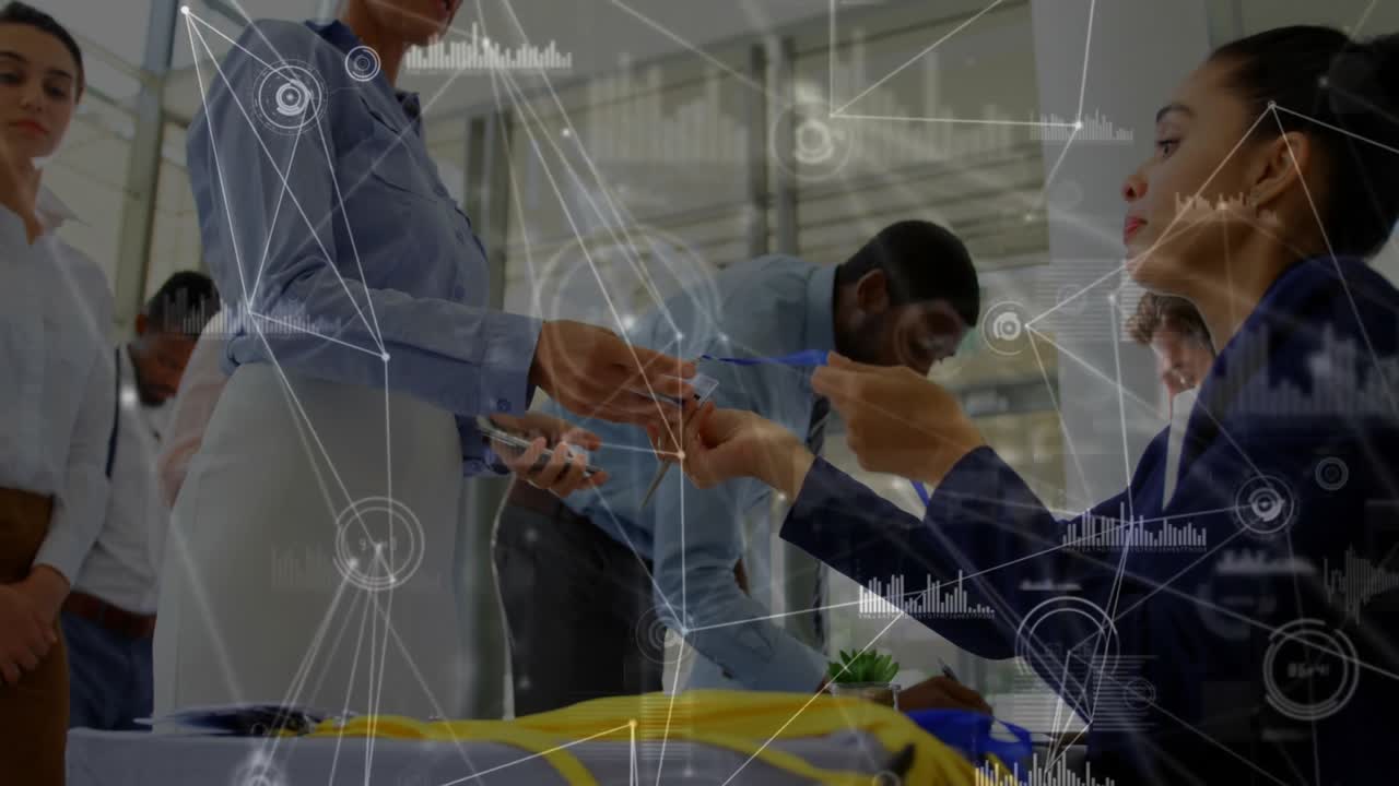 Attendees receiving badges at conference registration desk showing phones with network overlaying