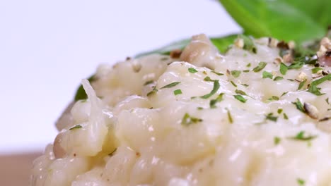 Macro-shot-of-homemade-risotto-rotating,-close-up-view-in-4k