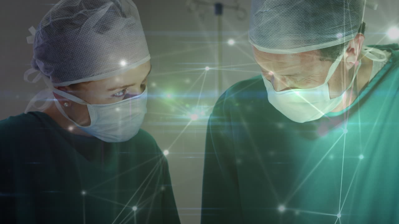 수술실에서 두 명의 백인 외과의사에 대한 연결 네트워크의 애니메이션