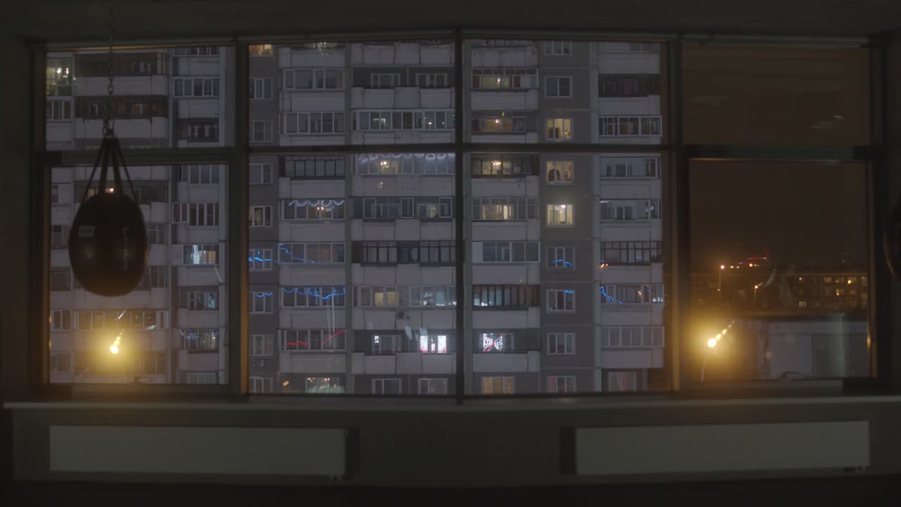 Boxing Gym at Night with City View