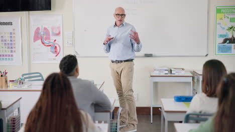 teacher giving a lesson to students in a classroom